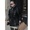 Lily-Rose Depp steps out in a black leather jacket, brown knee high boots  and Louis